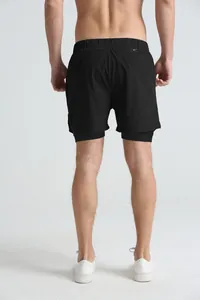 Rear view of men's black double-layer athletic shorts with quick-dry inner liner