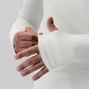 Detailed close-up of white men's compression sports top with functional thumbholes