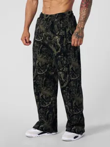 Men's loose street style jogger pants with realistic forest tree camouflage print