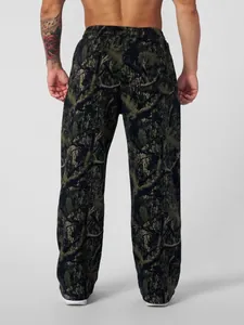 Rear view of men's loose joggers featuring a digital forest camouflage tree pattern