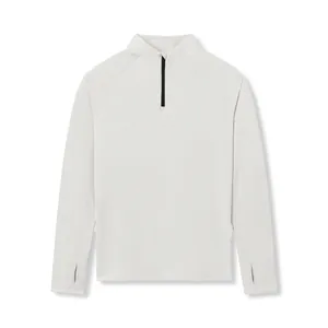 Front view detail of men's quick-dry half-zip sports compression long sleeve top in grey
