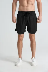Detailed view of men's double-layer athletic shorts with built-in liner for running