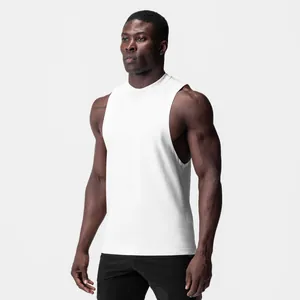 Detailed view of men's white muscle tank top with wide armholes for gym and fitness