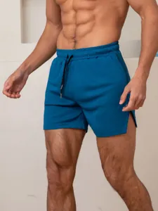 Sneldrogende sportshort voor heren in pauwenblauw voor hardlopen en fitnesstraining