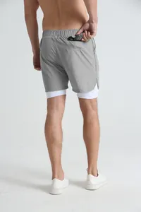 Back view of men's 2-in-1 grey sports shorts showing a practical rear zipper pocket