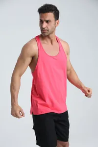 Detail view of a men's athletic pink tank top showing breathable fabric texture and fit.