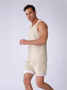 Detailed view of breathable men's beige mesh tank top and double-layer athletic shorts set.