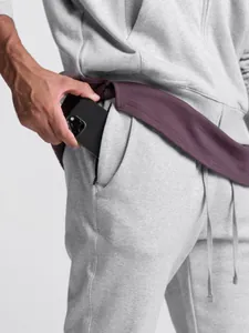 Graue Sport-Jogginghose für Herren in Slim Fit mit weichem Frottee und praktischer Tasche