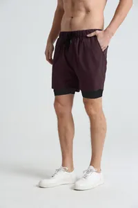 Men's double-layer quick-dry sports shorts designed for running and fitness training