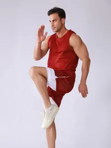 Athletic men's breathable mesh two-piece set featuring red tank top and double-layer shorts