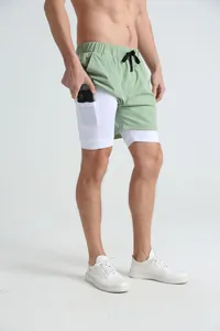 Detailed view showing functional side pocket on white inner liner of men's athletic shorts