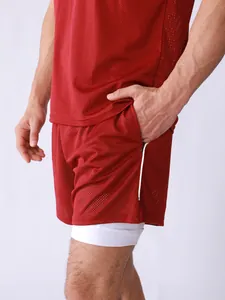 Close-up of men's breathable red mesh sports vest and double-layer shorts with zip pocket