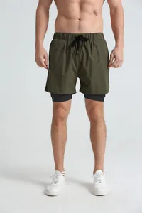 Men's olive green 2-in-1 running shorts with black compression lining and drawstring