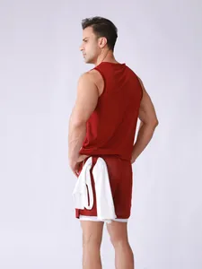 Back view of burgundy mesh sports set showing tank top and double-layer shorts