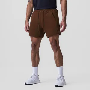 Detail view of men's brown breathable cotton athletic shorts for running and gym