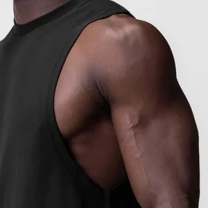 Close-up detail of a men's black sports tank top with wide armholes for gym workout.