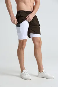 Detail view of men's double-layer sports shorts showing the functional inner pocket.