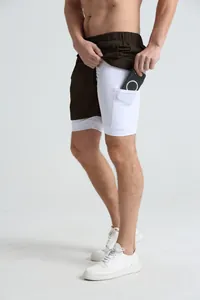 Detail of built-in phone pocket on white inner liner of men's 2-in-1 shorts for fitness