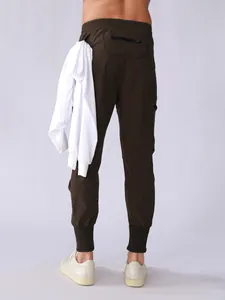 Back view of men's quick-dry brown cargo joggers with elastic cuffs and pocket detail