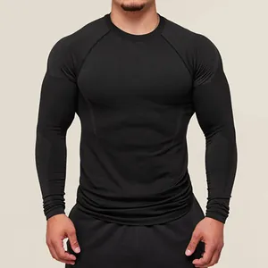 Detail shot of men's black compression long sleeve shirt for gym fitness training