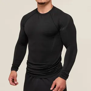 Detail view of men's quick-dry compression gym shirt showing honeycomb fabric texture