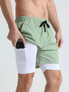Men's 2-in-1 athletic running shorts with built-in phone pocket on compression liner