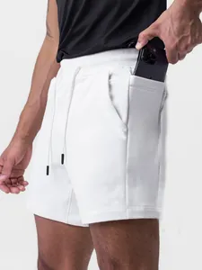 Men's white breathable cotton sports shorts featuring drawstring waist and side pockets