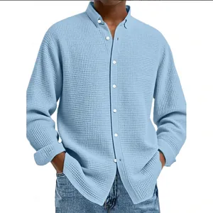 Detail view of light blue waffle knit texture on this men's casual long sleeve shirt.