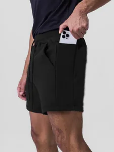 Men's black breathable cotton athletic shorts with side phone pocket for running and gym