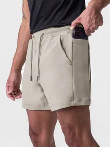 Professional men's breathable cotton athletic shorts with functional phone pocket for gym