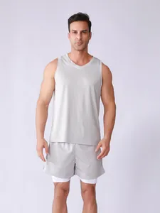 Detailed view of grey mesh breathable tank top and double-layer sports shorts set