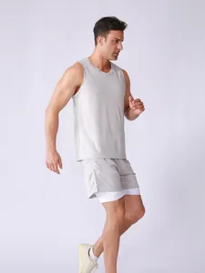 Side view of men's breathable grey sleeveless tank top and double-layer sports shorts