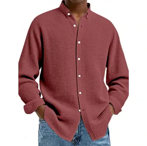 Detailed view of the waffle knit texture on this men's burgundy long sleeve casual shirt