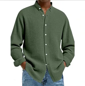 Close-up detail of olive green waffle knit long sleeve shirt for men in casual style