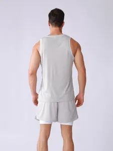 Rear view of a man wearing a breathable gray mesh tank top and sports shorts set