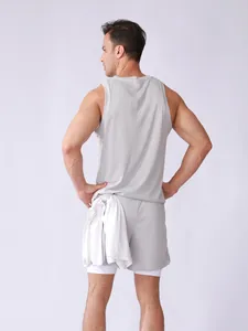 Back view of men's breathable gray mesh sports set with sleeveless tank and layered shorts.