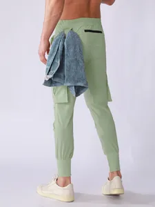 Back view of men's quick-dry sports joggers with functional towel loop feature