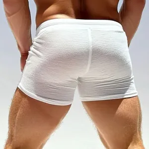 Detailed back view of white breathable men's fitness shorts showing fit and fabric