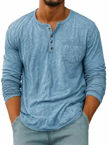 Detailed close-up of a men's light blue long-sleeved Henley shirt with a chest pocket.