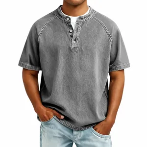 Detail view of men's vintage grey washed cotton Henley shirt with raglan sleeves