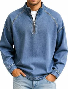 Macro view of vintage washed denim half-zip pullover showing collar and zipper details