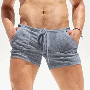 Detail view of men's grey breathable casual shorts with adjustable drawstring waist