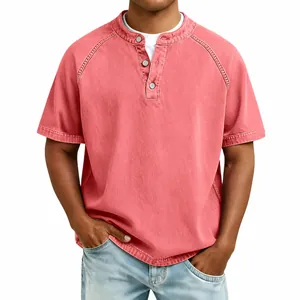Detailed view of vintage washed cotton henley t-shirt with classic button collar
