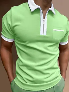 Close-up of men's slim fit green polo shirt with white zipper collar and chest pocket