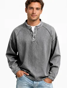 Detail of men's retro distressed grey washed cotton Henley long-sleeve shirt