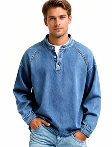 Detail showing vintage washed blue denim texture on men's Henley shirt