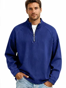 Close-up detail of a vintage washed navy blue quarter-zip henley shirt for men
