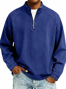 Close-up detail of a vintage washed navy blue quarter-zip henley shirt for men