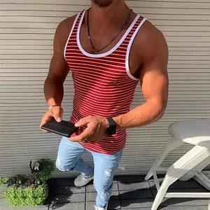 Close-up of men's red and white striped fitness tank top in casual setting.