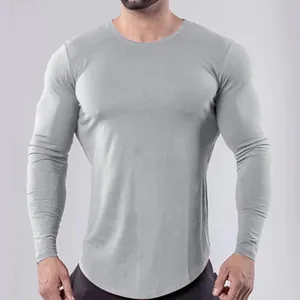T-shirt de compression gris à manches longues pour homme, idéal pour le fitness